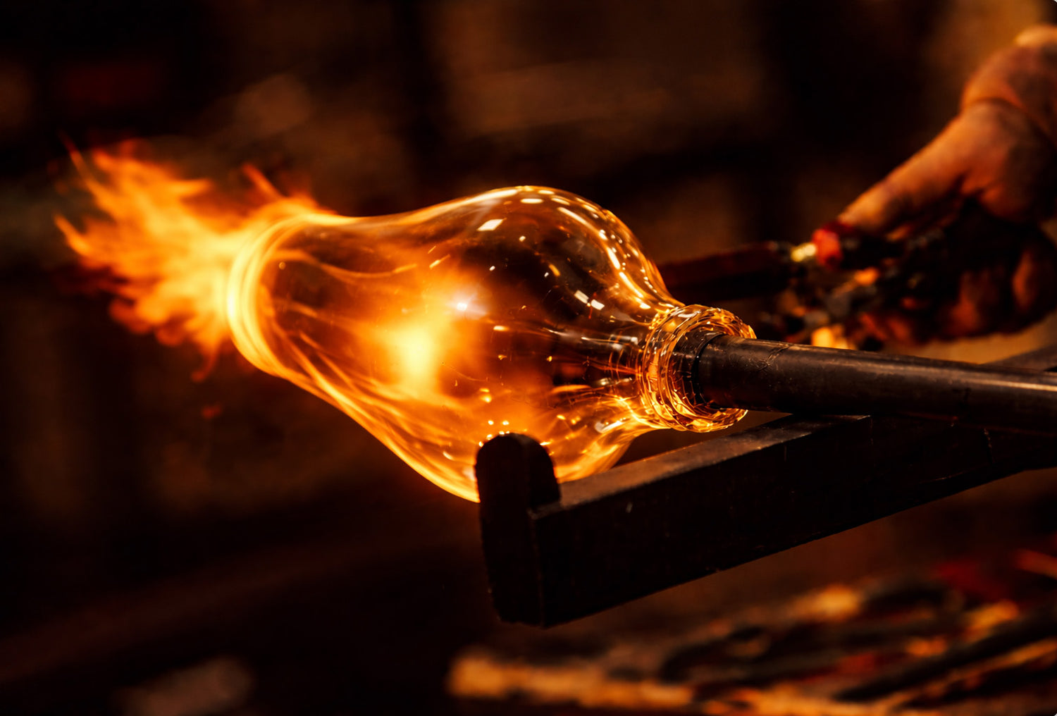 Glassblower crafting the Bevage carafe