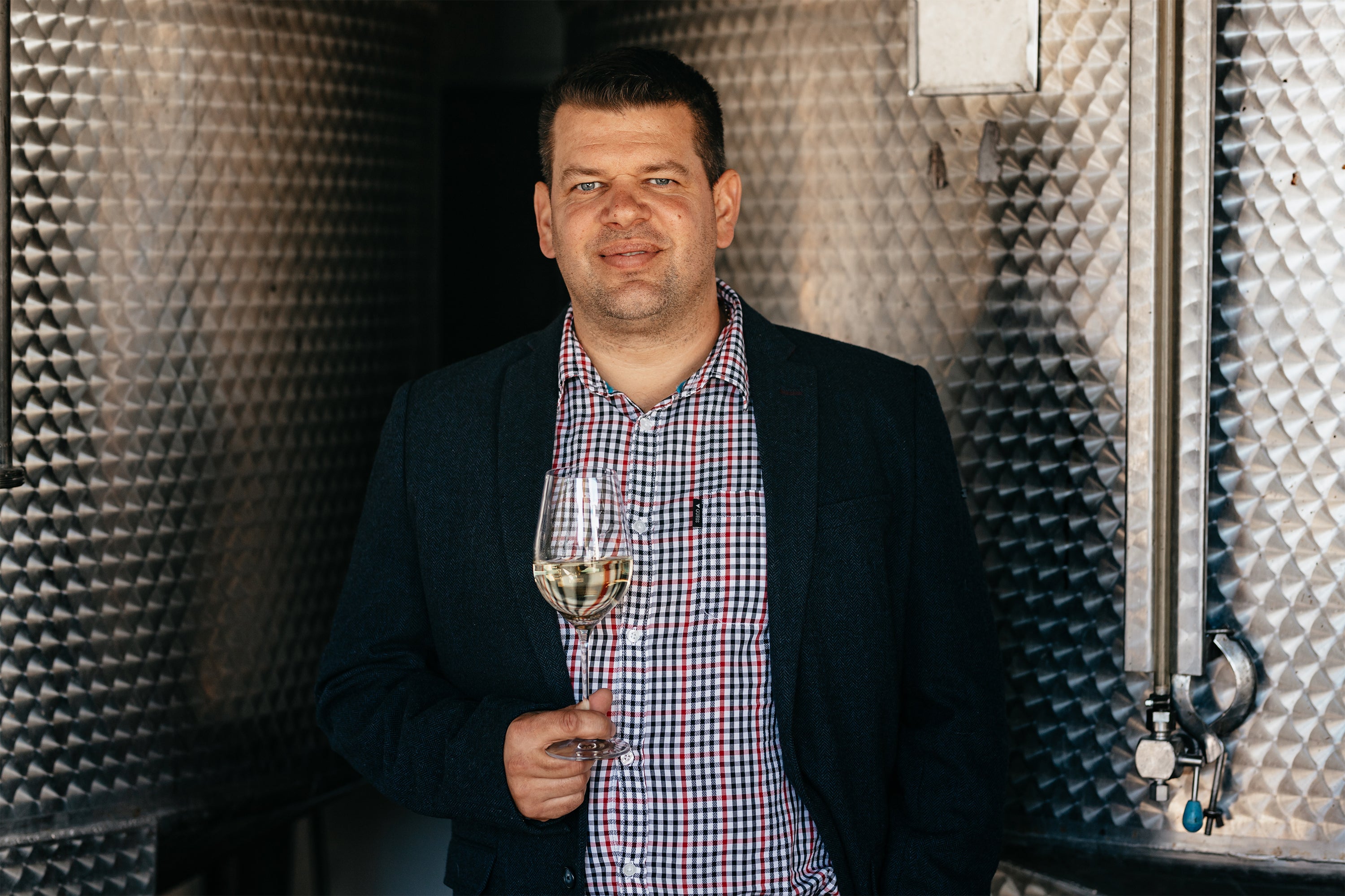 Winemaker Gábor Berger in the wine cellar